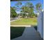 Sidewalk leading to grassy area at 402 Dorchester Sq, Lake Mary, FL 32746