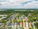 Neighborhood aerial view showing the property's location near a lake at 4094 Oak St, Orlando, FL 32814