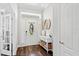 Bright foyer with stylish decor, wood floors, and ample natural light at 4094 Oak St, Orlando, FL 32814