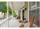 Inviting front porch featuring comfortable seating and a welcoming ambiance at 4094 Oak St, Orlando, FL 32814