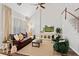 Bright living room featuring comfortable seating, fireplace, and hardwood floors at 4094 Oak St, Orlando, FL 32814