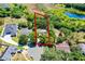 Expansive aerial shot showcasing the home's location within a lush, wooded neighborhood at 485 Sandpiper Ridge Dr, Orlando, FL 32835