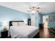 Bedroom features a ceiling fan, natural light, and access to an ensuite bathroom at 485 Sandpiper Ridge Dr, Orlando, FL 32835