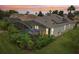 Beautiful backyard with screened pool and lush landscaping at 506 Pineloch Dr, Haines City, FL 33844