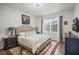 Comfortable bedroom with neutral tones, natural light, and decorative accents at 506 Pineloch Dr, Haines City, FL 33844