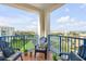 Relaxing balcony offers scenic views and comfortable seating at 5300 S Atlantic Ave # 2-501, New Smyrna Beach, FL 32169