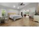 Spacious bedroom with an ensuite bathroom and natural lighting at 5340 Jones Rd, St Cloud, FL 34771