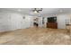 Large bonus room with ample lighting, doors and tile floors at 5340 Jones Rd, St Cloud, FL 34771