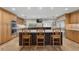 Spacious kitchen island seating and stainless steel appliances at 5340 Jones Rd, St Cloud, FL 34771