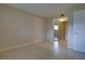 The serene bedroom offers generous space with tiled floors, a closet, and natural light at 576 Fairways Ln # M103, Ocala, FL 34472