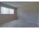 Bright bedroom with tile floor, neutral paint and a window that provides ample natural light at 576 Fairways Ln # M103, Ocala, FL 34472