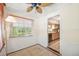 Eat-in kitchen with tile floor, fan, and view of the kitchen at 600 Brechin Dr, Winter Park, FL 32792