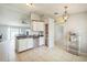 Bright and airy kitchen with an open layout, counter seating, and modern stainless steel appliances at 62 York Ct, Kissimmee, FL 34758