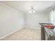 Spacious laundry room featuring new washer and dryer units, tile flooring, and plenty of room at 62 York Ct, Kissimmee, FL 34758