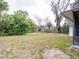 Expansive backyard offering abundant space for outdoor activities and recreation at 633 Hermits Trail, Altamonte Springs, FL 32701