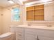 Bright bathroom featuring a double sink vanity with plenty of cabinet space and a shower/tub combo at 633 Hermits Trail, Altamonte Springs, FL 32701