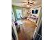 Bedroom featuring window, hanging chair, ceiling fan, mounted TV, and toys at 651 Holbrook Cir, Lake Mary, FL 32746