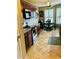 Well-lit kitchen with stainless steel appliances, granite countertops, and a cozy breakfast nook area at 651 Holbrook Cir, Lake Mary, FL 32746
