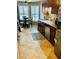 Bright kitchen featuring updated appliances, granite countertops, and a functional layout with eat-in breakfast nook at 651 Holbrook Cir, Lake Mary, FL 32746