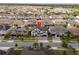 Stunning aerial view of a home with a well-manicured lawn in a desirable community with a water view at 8109 Ludington Cir, Orlando, FL 32836