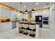 Modern kitchen with sleek cabinets, stainless steel appliances, and a stylish island with bar stool seating at 8109 Ludington Cir, Orlando, FL 32836