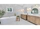 Luxurious bathroom with a freestanding tub, double vanity, and marble countertops at 840 Dyson Dr, Winter Springs, FL 32708