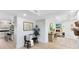 Foyer features wood floors, bench seating and view into the living room at 840 Dyson Dr, Winter Springs, FL 32708