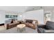 Spacious living room featuring hardwood floors, neutral paint, and modern furniture at 840 Dyson Dr, Winter Springs, FL 32708