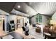 Bright living room with hardwood floors, a vaulted ceiling, and modern design at 840 Dyson Dr, Winter Springs, FL 32708