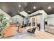 Spacious living room featuring a dark wood ceiling, hardwood floors, and modern decor at 840 Dyson Dr, Winter Springs, FL 32708