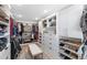 Spacious walk-in closet with custom shelving and lots of storage space at 840 Dyson Dr, Winter Springs, FL 32708