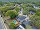 Aerial view showcasing backyard with a wooden deck and an inviting above-ground pool at 1010 Chokecherry Dr, Winter Springs, FL 32708