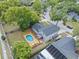 Aerial view of home with pool, patio, and deck at 1010 Chokecherry Dr, Winter Springs, FL 32708