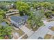 Charming two-story home features a spacious driveway, manicured lawn, and lovely backyard deck at 1010 Chokecherry Dr, Winter Springs, FL 32708