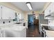 Spacious kitchen with stainless steel appliances and white countertops at 1010 Chokecherry Dr, Winter Springs, FL 32708