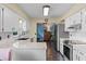 Bright, open kitchen featuring stainless steel appliances and an eat-in dining area at 1010 Chokecherry Dr, Winter Springs, FL 32708