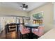 Eat-in kitchen area with backyard pool view from large window and features round table with chairs at 1010 Chokecherry Dr, Winter Springs, FL 32708
