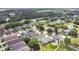 Expansive aerial perspective showcases the community's well-planned layout, complemented by mature trees and green spaces at 10621 Golden Cypress Ct, Orlando, FL 32836