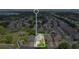 Aerial view of home highlighting location near lake, community amenities, and appealing neighborhood design features at 10621 Golden Cypress Ct, Orlando, FL 32836