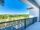 A spacious balcony overlooking the pool and yard at 1080 E Jack Nicklaus Ct, Kissimmee, FL 34747
