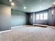 Finished basement with plush carpeting, recessed lighting, and a window offering natural light at 1080 E Jack Nicklaus Ct, Kissimmee, FL 34747
