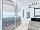 A bright, open kitchen featuring stainless steel appliances, a large island, and modern recessed lighting at 1080 E Jack Nicklaus Ct, Kissimmee, FL 34747