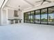 An expansive outdoor living area featuring a full outdoor kitchen, a pool and plenty of space at 1080 E Jack Nicklaus Ct, Kissimmee, FL 34747