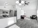 Open-concept living space showcasing a seamless blend of the kitchen, dining area, and living room at 12388 Se 106Th Ave, Belleview, FL 34420