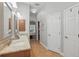Bathroom features a double vanity with granite countertops and tiled flooring at 128 Lake Region Cir, Winter Haven, FL 33881