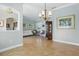 Inviting living room with tiled floors, neutral paint, and elegant decor at 128 Lake Region Cir, Winter Haven, FL 33881