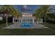 A backyard pool surrounded by palms, luxurious tiling, and large windows for seamless indoor-outdoor living at 13125 Casabella Dr, Windermere, FL 34786