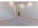 Bright bedroom featuring ensuite bathroom and walk-in closet at 13125 Casabella Dr, Windermere, FL 34786