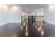 Upstairs hallway with hardwood floors, recessed lighting and an elegant chandelier at 13125 Casabella Dr, Windermere, FL 34786