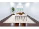 Bright home office with dark hardwood floors, neutral rug, and natural light from window at 13125 Casabella Dr, Windermere, FL 34786
